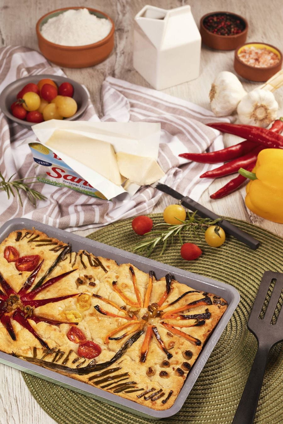 recipe image Sarımsaklı ve Taze Otlu Pizza Ekmek (Focaccia)